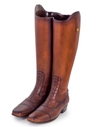 This very unusual pair of riding boots umbrella stand will add a touch of class to your home, whether holding brollies, walking sticks or flowers. Measures 49 x 21 x 29 cm. Great value for money.