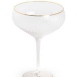 A photo of a single traditional coupe glass, from the set of 6