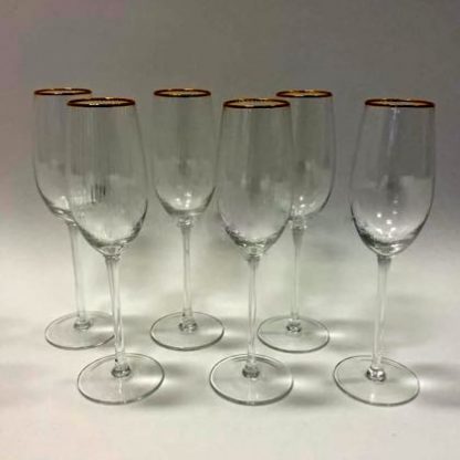 Super stylish and elegant champagne flute glasses set! Perfectly formed, delicately ribbed with fine gold rim. Uber Cool! 24 x 6.5 x 6.5cm