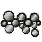 Selection of mini black framed convex mirrors, ranging from 6 cm to 19 cm in diameter. Perfect anywhere.