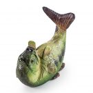 The fish is on his back with his mouth wide open and his fins held up to hold the neck of the bottle.  Despite the silliness this is a well balanced sturdy piece that won't see your wine go tumbling!!