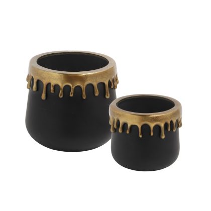 Create a unique space at home with this pair of stunning black gold drip pots. Made of coloured aluminium that has a great finish. 25 x 25 x 21cm