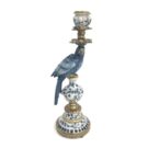 Bring a lively exotic feel with this antiqued ceramic ornate blue parrot candle holder. Beautifully made, finished and detailed. 9 x 9 x 28cm