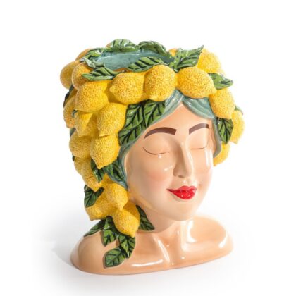 Make a statement with this wonderful Lady Lemon bust vase. She is bright, colourful and made of resin. Perfect colouring. Great gift! 29 x 24 x 21cm.