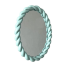 Add a splash of colour and fun to your home with this oval mint wall mirror. Simple rope design. Made of resin and glass. 40 x 40 x 3cm