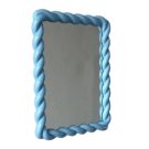 Add a splash of colour and fun to your home with this rectangular blue wall mirror. Simple rope design. Made of resin and glass. 40 x 40 x 3cm