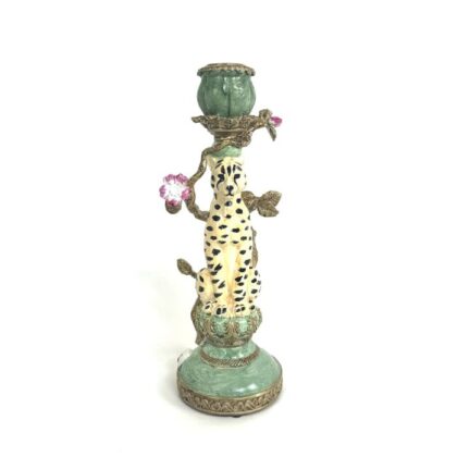 Bring a lively and exotic feel with this ceramic ornate leopard candleholder. Beautifully made, finished and detailed. 10 x 10 x 26cm
