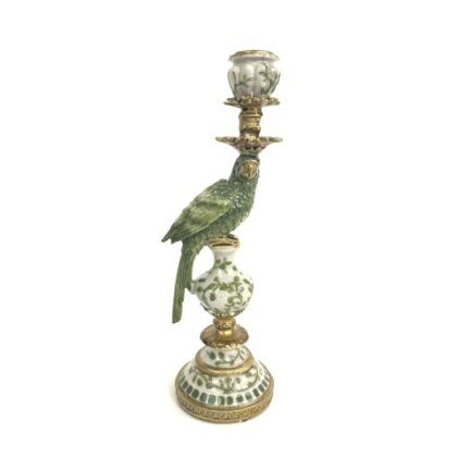 Bring a lively and exotic feel with this ceramic ornate green parrot candleholder. Beautifully made, finished and detailed. 9 x 9 x 28cm