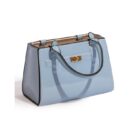 Add a glamorous vibe to your home with this soft blue handbag vase. Made of ceramic, super glossy finish 16 x 14 x 24cm. Works as a utensil holder too
