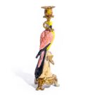 Bring a lively and exotic feel with this ceramic ornate parrot candleholder. Beautifully made, finished and detailed. 11 x 11 x 33cm