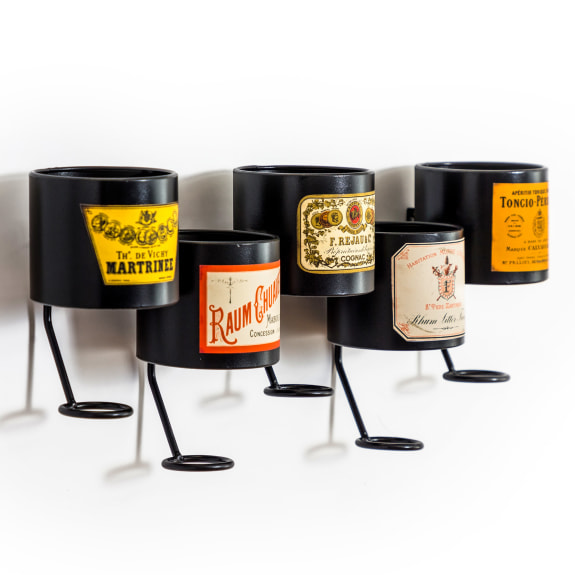 This vintage styled metal wall mounted wine rack has a fabulous authentic french vibe and securely holds 5 bottles to your wall. 53 x 22 x 11.5cm