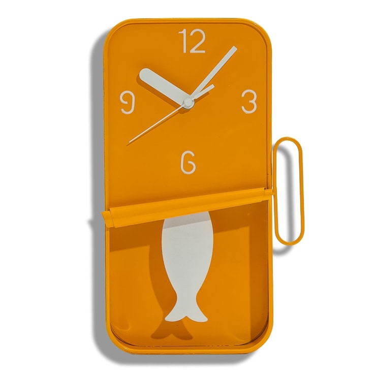 This glossy orange sardine tin clock is an absolute gem! Stripy orange fish tail and white hands.Perfect in the kitchen. 30 x 18 x 6cm. Great value.
